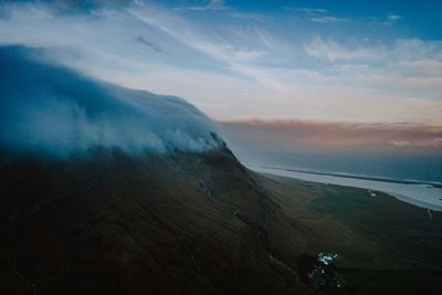 Scenic view of mountains against sky during sunset