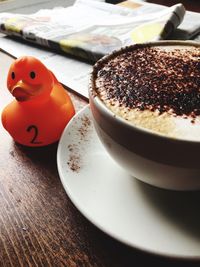 Close-up of coffee cup on table