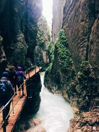 People looking at waterfall