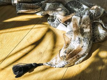 High angle view of shadow on bed