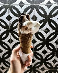Midsection of woman holding ice cream