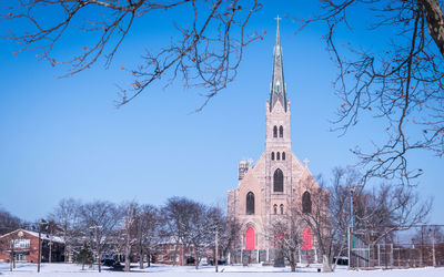 Low angle view of church during winter
