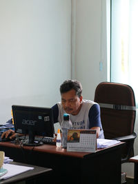 Man working on table