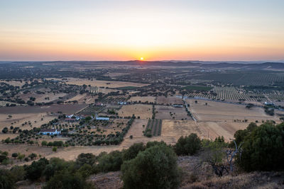 High angle view of townscape against sky during sunset