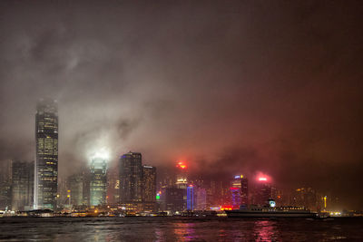 Illuminated cityscape at night