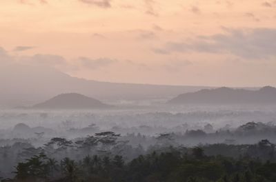 Scenic view of mountains against sky during sunset