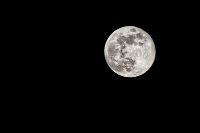 Low angle view of full moon in sky