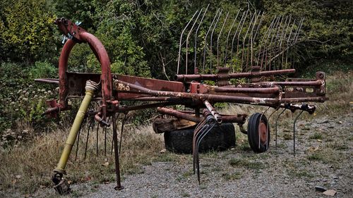 Old rusty bicycle on field