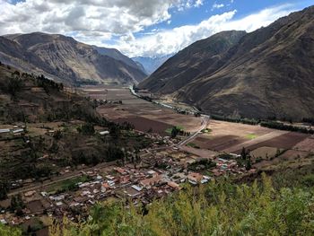 Scenic view of landscape and mountains against sky