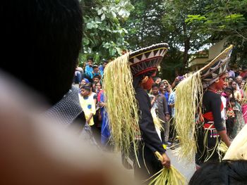 Rear view of people in traditional building