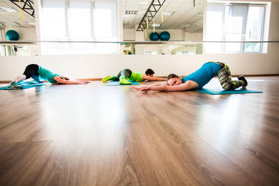 Woman lying on floor