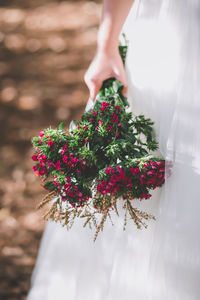 Low section of woman on flower