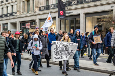 Group of people on street in city