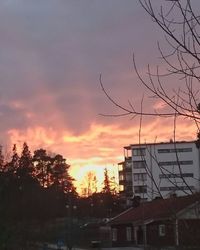 Silhouette of building at sunset