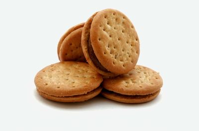 Close-up of cookies against white background