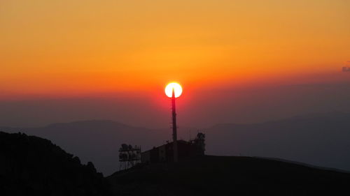 Silhouette of trees at sunset