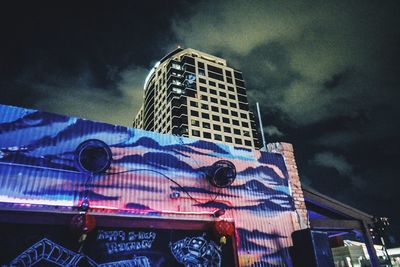 Low angle view of skyscraper against sky