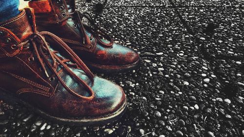 High angle view of black and shoes in water