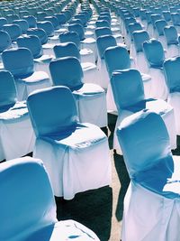 High angle view of chairs in row