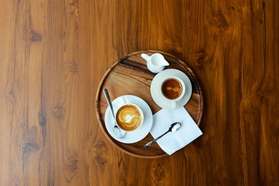 High angle view of coffee cup on table