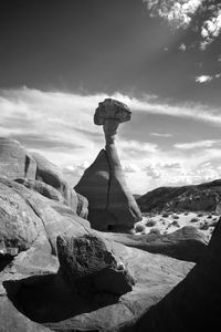 Scenic view of rock formation against sky