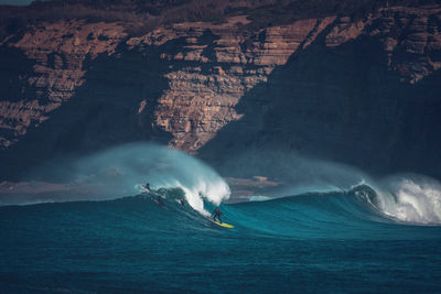 Surfing in a cold morning