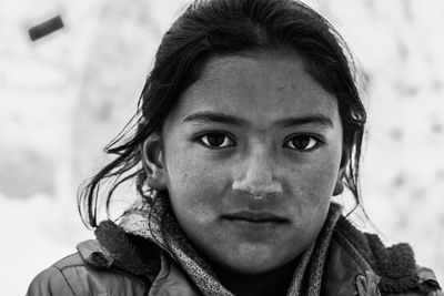 Portrait of woman standing outdoors