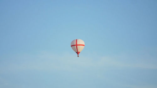 Hot air balloon in the blue sky. aerostat, airship. red balloon.