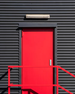 Red closed shutter of building