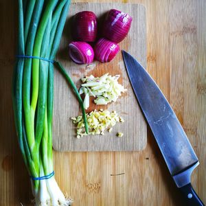 High angle view of chopped vegetables on cutting board