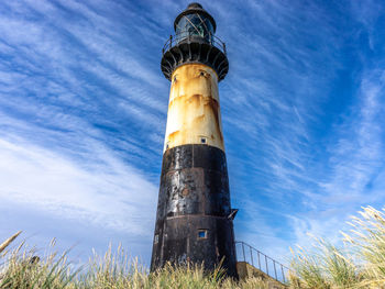 Low angle view of lighthouse against sky