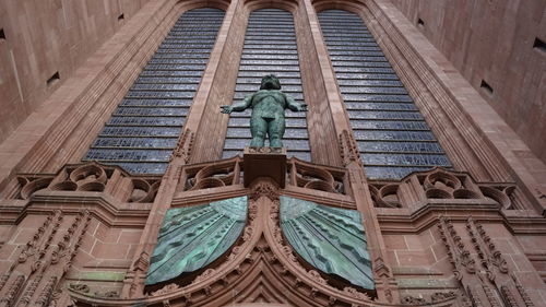 Low angle view of statue of historic building