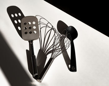 High angle view of kitchen utensils on table