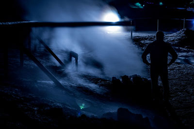 Close-up of woman in dark