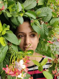 Woman walking with flowers, beautiful eye's and flowers. one with nature 