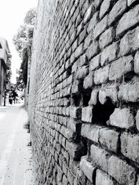 Close-up of brick wall in city