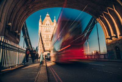 Blurred motion of vehicles on tower bridge in city