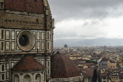 Duomo santa maria del fiore in city against sky