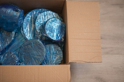 High angle view of cardboard box on table