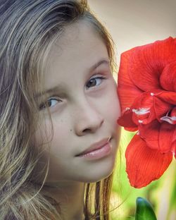 Close-up portrait of smiling young woman