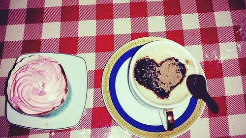 Close-up of coffee served on table