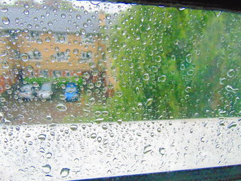 Close-up of water drops on glass