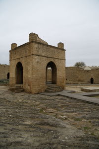 Old ruins of building against sky