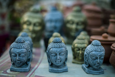 Close-up of figurines on table