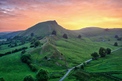 Scenic view of landscape against sky during sunset