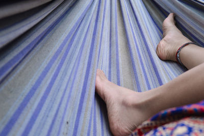 Low section of woman in hammock