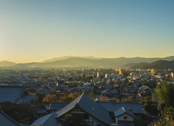 High angle view of kyoto against sky at sunset