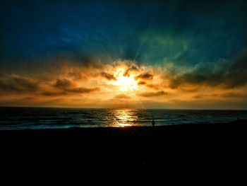 Scenic view of sea at sunset
