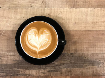 Directly above shot of cappuccino on table