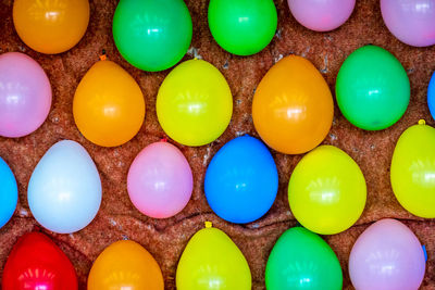 Colourful balloons on a wall for throwing arrows at a funfair, background abstract